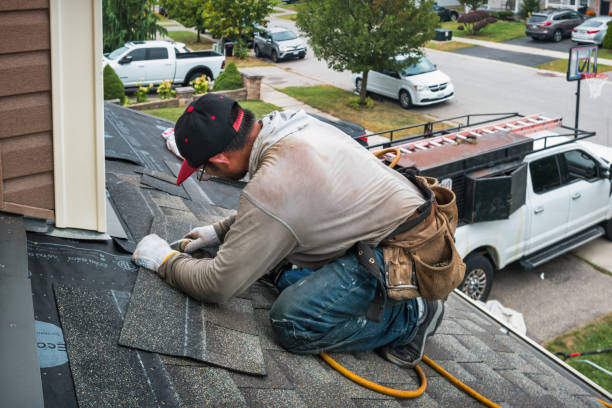 Professional Roofing technician working in Coats, NC